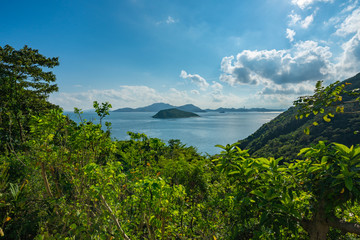 Fototapeta na wymiar Green islands floating off the coast of Stanley, Hong Kong