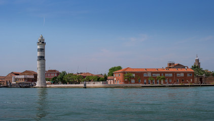 View of Murano island. In the foreground is the lighthouse of the island of Murano.