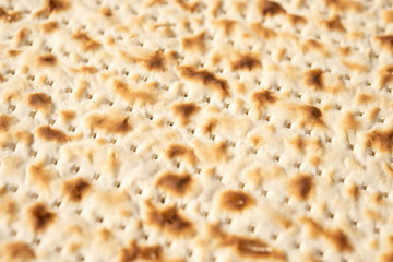Matzah or flatbread closeup. Backgroun, food or texture.