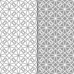 Gray and white geometric ornaments. Set of seamless patterns