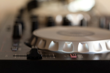 Fototapeta na wymiar DJ to mix & play music on Turntable vinyl record player