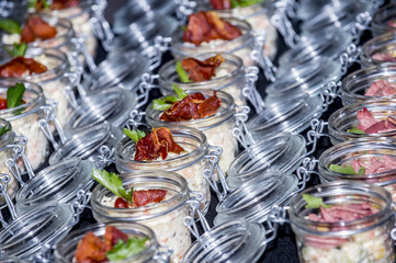 Salads with meat in a glass jar