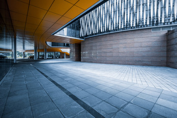 empty brick road nearby office building, china.