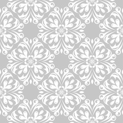 Fototapeta premium White floral seamless design on gray background