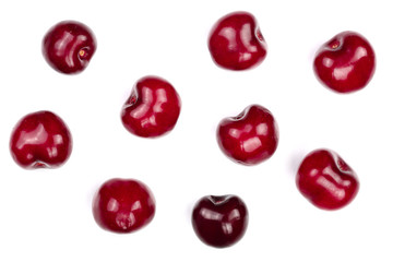 Sweet red cherries isolated on white background. Top view. Flat lay pattern