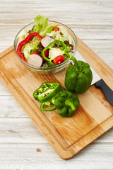 cutting vegetables for salad