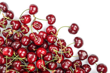 Obraz na płótnie Canvas Sweet red cherries isolated on white background with copy space for your text. Top view. Flat lay pattern