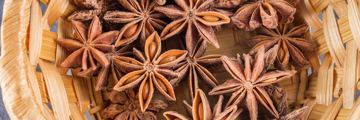 star anise and cinnamon on the gray background