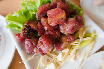 Special food pork spare rib fried Thai style on white dish.