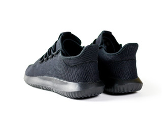 Men's black sports shoes. For sports. Isolated on white background