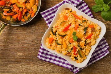 Millet with vegetables and raisins.