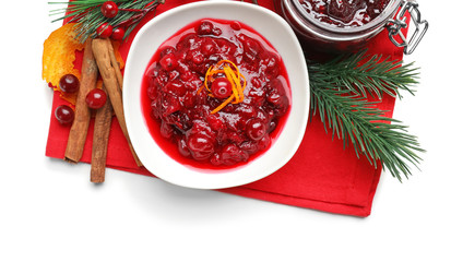 Flat lay composition with cranberry sauce on red cloth