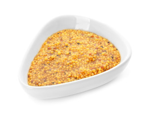 Dijon mustard in bowl on white background