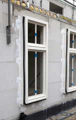 Building site with house under construction