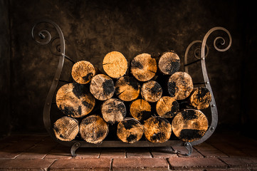 Firewood stack in dark