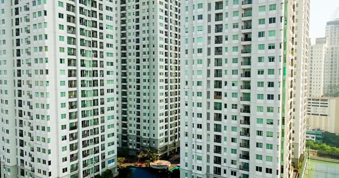 JAKARTA, Indonesia - June 08, 2018: Aerial landscape of condominium or apartment building complex in Jakarta downtown. Shot in 4k resolution