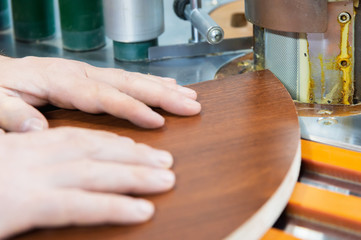 Carpenter works for Edge Banding Machine In workshop