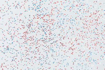 4th of July American Independence Day decorations on pastel blue background. Flat lay, top view