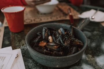 Fried oysters in a frying pan