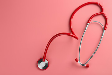 Fototapeta premium Stethoscope on color background
