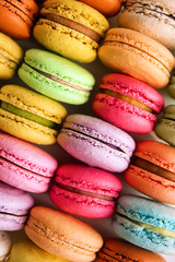 Tasty colorful macarons, top view
