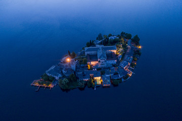 Aerial View at night of San Giulio island, lake Orta, northern Italy.