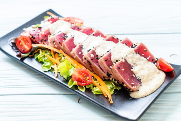 fresh tuna raw with vegetable salad and sauce