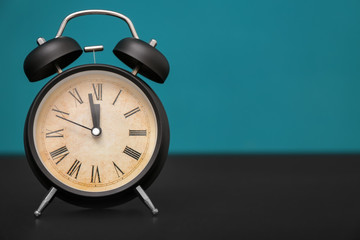 Alarm clock on table. Time management concept