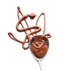 Spoon and molten chocolate on white background