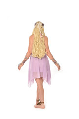 full length portrait of blonde fairy girl, standing pose with back to the camera. isolated on white background.