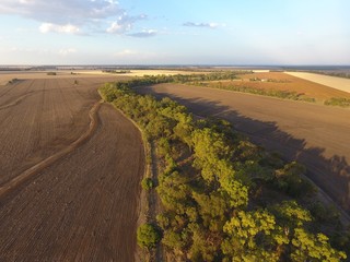 Creek flowing through agricultural land on the Western Downs in Rural Queensland, Australia