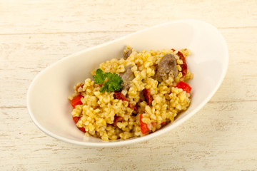 Bulgur with chicken hearts