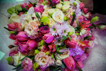 The composition is made by florists from fresh flowers.