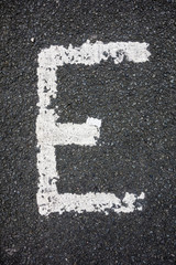 Written Wording in Distressed State Typography Found Letter E