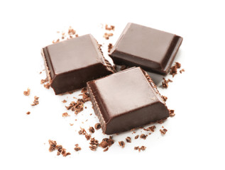 Pieces of dark chocolate on white background