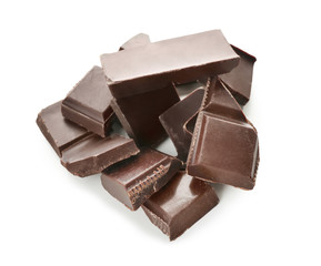 Pieces of dark chocolate on white background