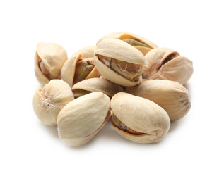 Tasty pistachio nuts on white background