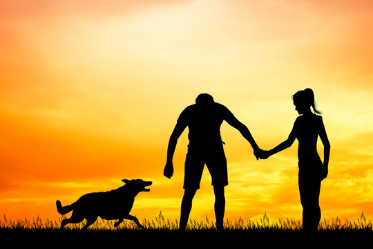 man and girl with dog