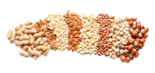 Composition with different types of nuts on white background