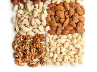 Composition with different types of nuts on white background