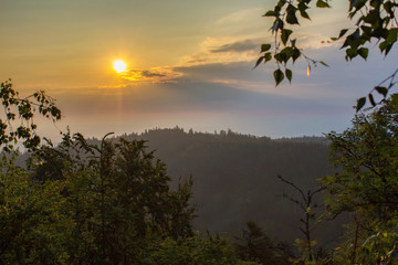 Amazing sunrise through trees, Mandelstein, Austria