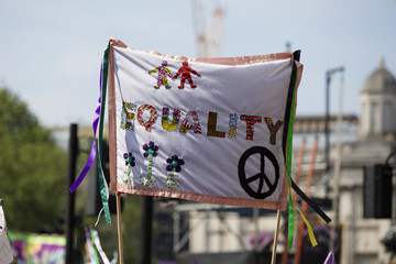 A gender equality banner at a feminist protest march