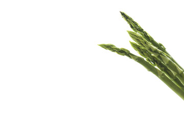 bunch of green asparagus on isolated white background