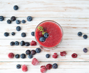 Fresh smoothie vegan from the frozen raspberry and bilberry
