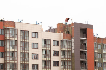 Facade of a multi-storey building under construction