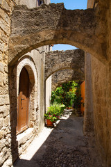 Medieval alley in Rhodes Town, Rhodes Island, Mediterranean Sea, Greece