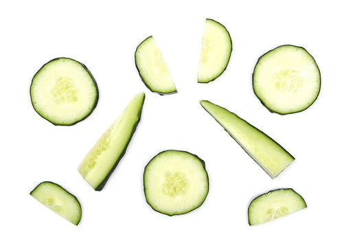 Cucumber slices isolated on white background, top view