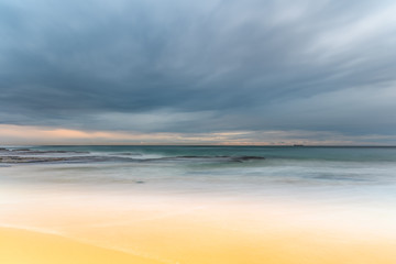 Fototapeta na wymiar Overcast and Softly Beautiful Morning Seascape