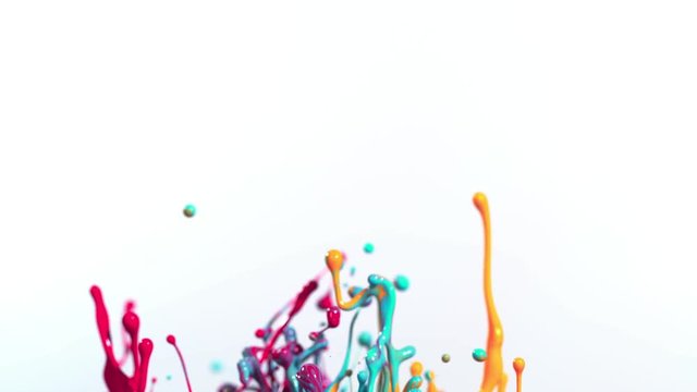 Colorful splashing paint in super slow motion. Shot with high speed cinema camera, 1000fps