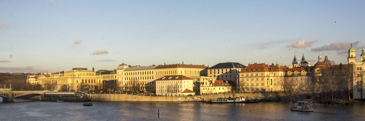 View on the old center of Prague, capital of the Czech Republic with the river Moldau on the foreground